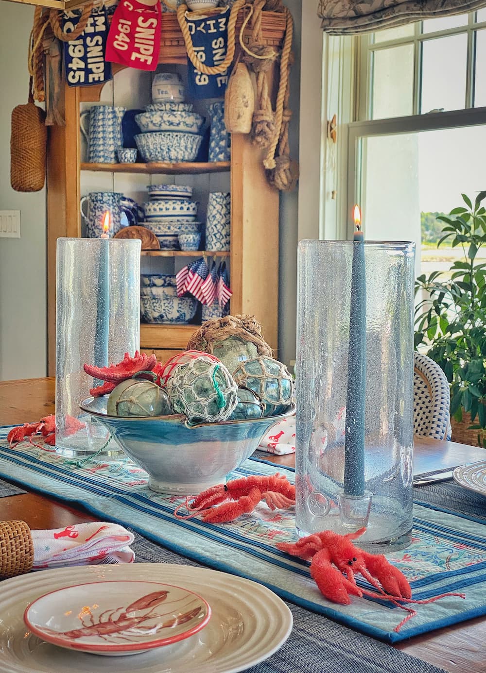 Coastal Maine cottage with lobster patriotic tablescape