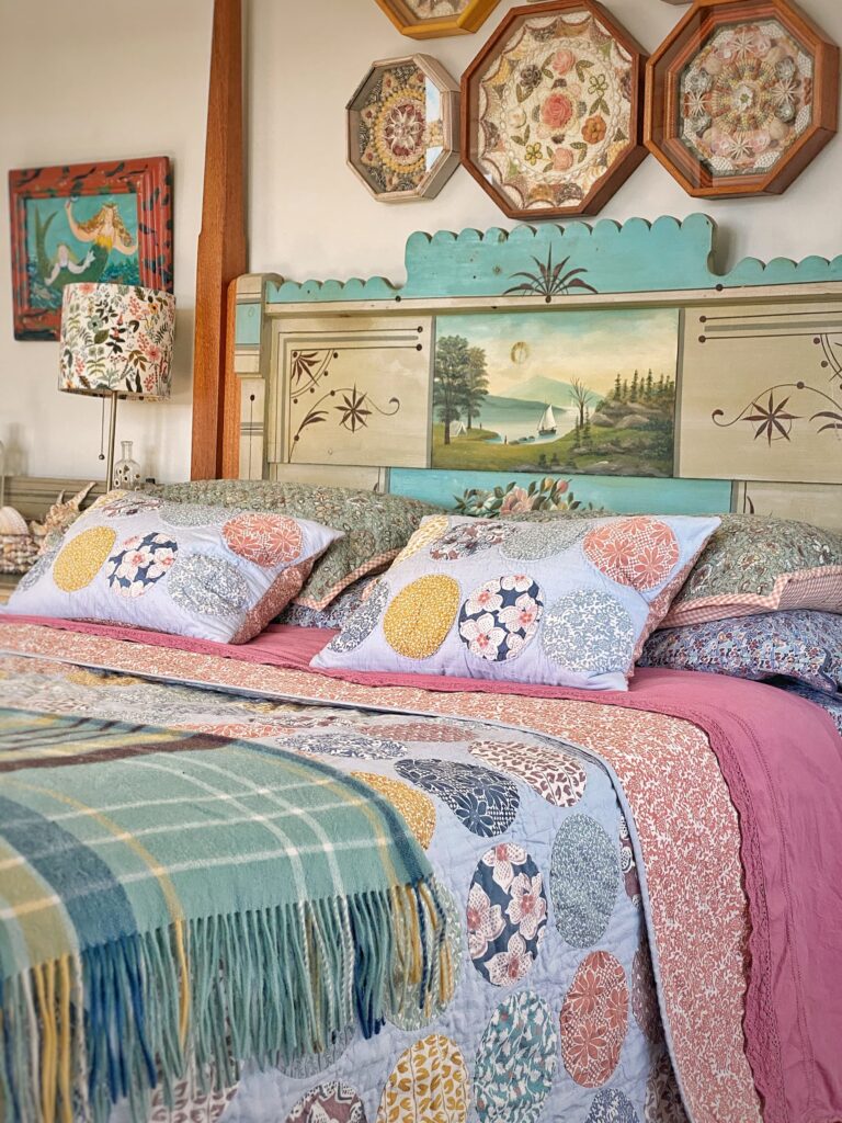 Cozy fall mix and match bedding with painted cottage bed and sailors valentines