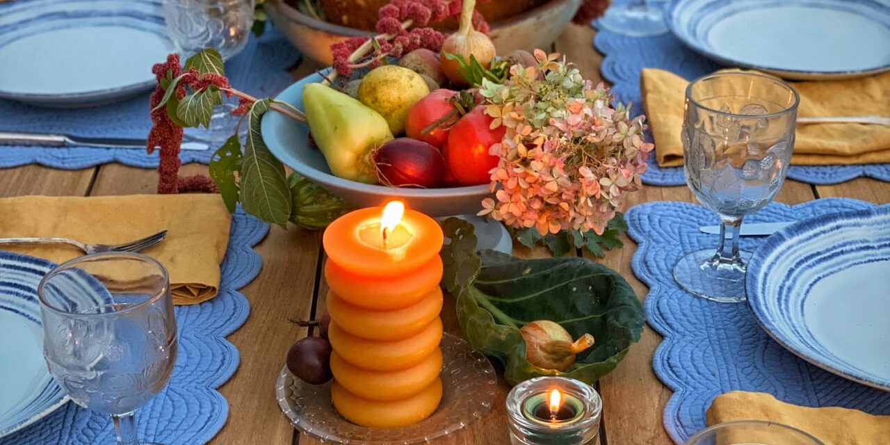 An Outdoor Harvest Table Set With Fall’s Bounty
