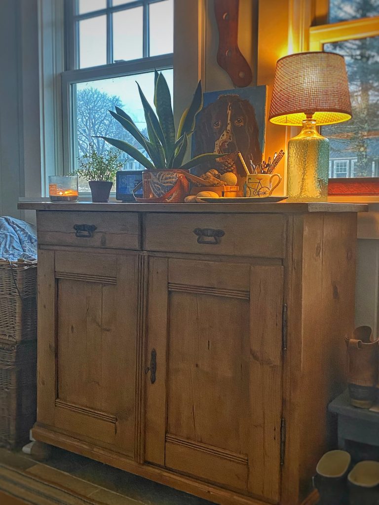 Antique pine cabinet in mudroom